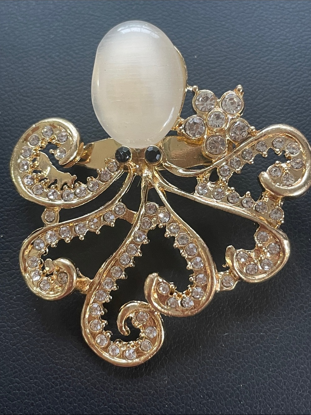 Gold-Tone Crystal Octopus Brooch with Cat eye stone Accent - White 2” New